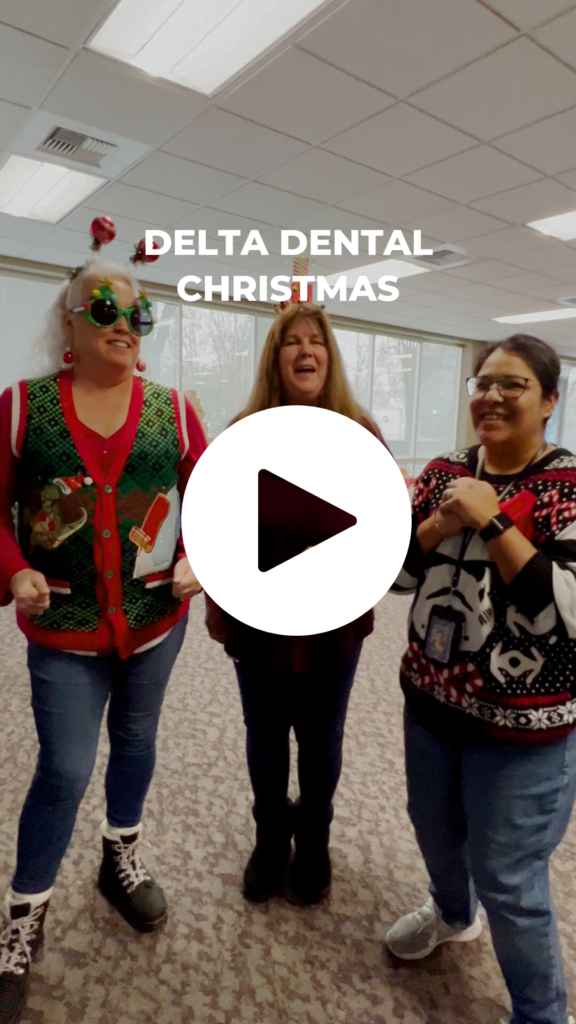 Three ladies dressed up in Christmas outfit for work party.